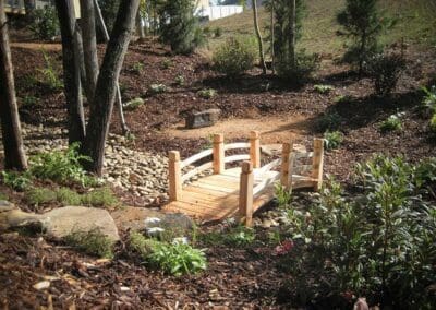 Southern Greenscapes Landscape Design & Construction | Rock Hill, SC | landscapes with small bridge